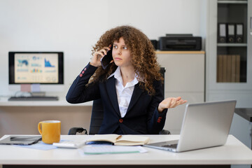 caucasian businesswoman involved in cellphone call conversation  giving professional consultation...