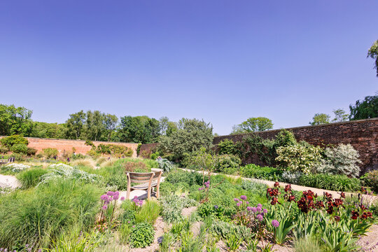 Bridgewater RHS walled garden with flower beds in UK.