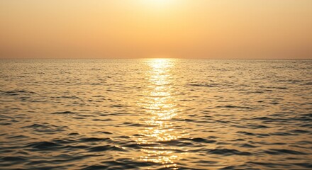 Obraz premium Sunset over calm ocean