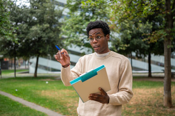 Young professional presenting ideas in urban park