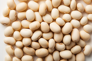 Pile of fresh, raw, organic white beans for healthy eating and cooking on white background