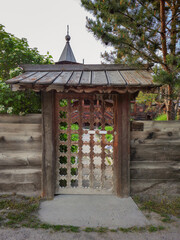 old carved wooden gate in old wooden church