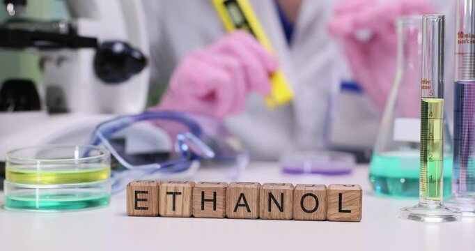 A detailed closeup image showcasing ethanol and various lab equipment within a scientific research environment