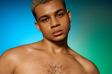 Stylish young man with dyed hair showcasing confidence in vibrant studio setting