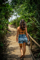 Woman Walking Barefoot to the Beach in Itamambuca, Ubatuba, Brazil