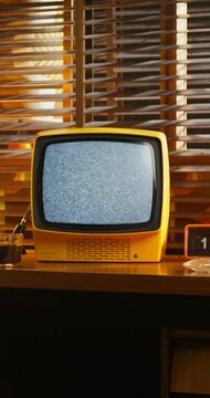 A monitor with ripples on the desktop screen. Retro office, interior details