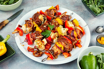 Skewer set of raw meat and vegetables.
