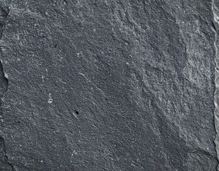 A black stone texture forms a rough and natural background