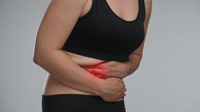 Woman Experiencing Abdominal Pain