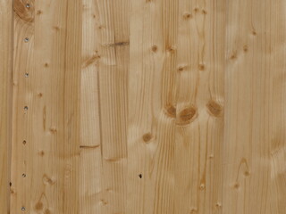 The wooden surface has a grainy texture and is made of wood