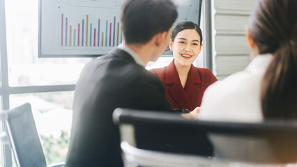 Business culture asian man woman gen y and gen z team working together in office