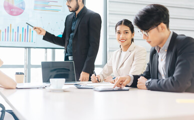 Business culture asian man woman gen y and gen z team working together in office