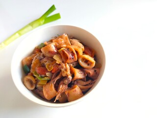 tumis cumi or oseng cumi or stir fried squid, traditional cuisine from Indonesia
