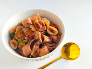 tumis cumi or oseng cumi or stir fried squid, traditional cuisine from Indonesia
