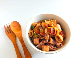 tumis cumi or oseng cumi or stir fried squid, traditional cuisine from Indonesia