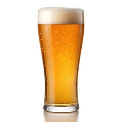 A pilsner glass filled with golden beer and a thick white head isolated on a white background view