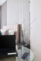 A Minimalist Bedroom Workspace with Modern Decor and Innovative Designs for Comfort