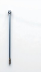 A photo featuring a steel rod as the main subject on the left side of the image