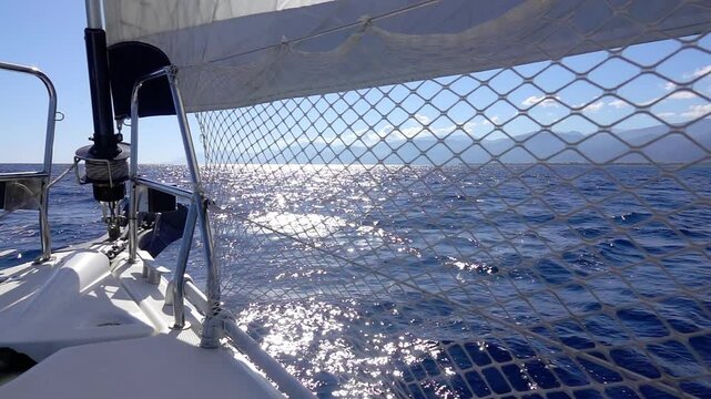 Sun Path on Water and Shadow from Sail. Slow Motion