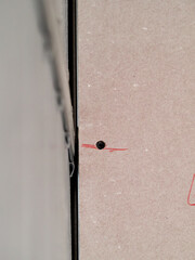 plasterboard plates screwed together without joining tape.
