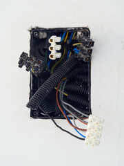 Cable junction box in a plasterboard wall