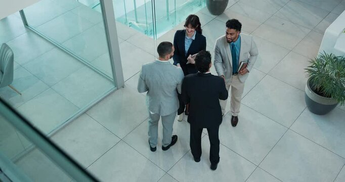 Handshake, welcome and above of business people in office for meeting, introduction and b2b conference. Opportunity, networking event and shaking hands with employees in agency for thank you