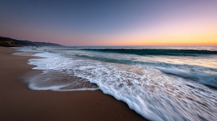 Peaceful Sunset Over Empty Beach with Soft Water Motion