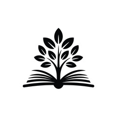 Black silhouette of a tree growing from an open book symbolizing knowledge and growth