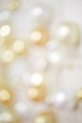 Soft focus abstract background with golden and silver lights
