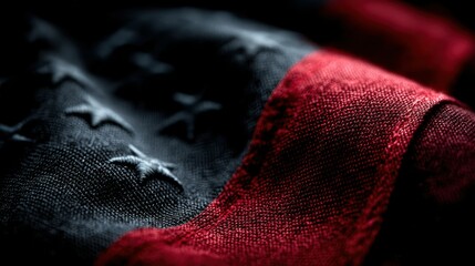 Details of a weathered American flag captured in daylight, showcasing rich colors and fabric textures