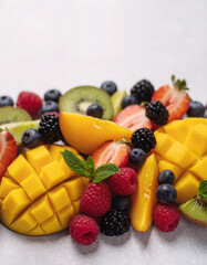 Organic tropical fruit background. The fruits are placed creatively. 