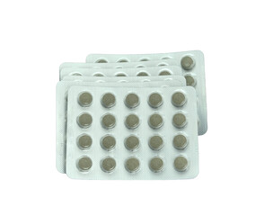 Herbal tablets in foil blister packs on transparent background