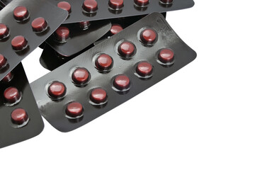 Tablets in foil blister packs on transparent background