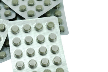 Herbal tablets in foil blister packs on transparent background
