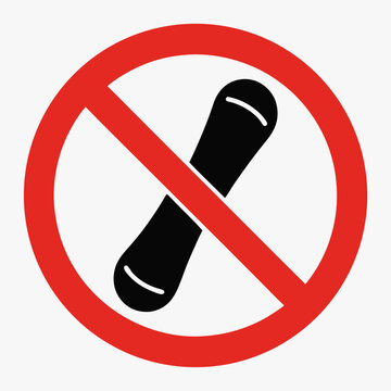 No snowboarding allowed, showing snowboard crossed out in prohibiting sign. Ban on snowboarding, prohibition sign with snowboard, indicates restricted area in mountain resort.