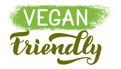 Handwritten lettering vegan friendly with green brush stroke promoting healthy lifestyle and animal rights, suitable for vegan restaurant menu or food packaging