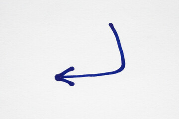 hand drawn arrow with blue marker pen on white background