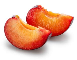 Two ripe chinese plum slices isolated on white background. File contains clipping paths.