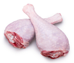 Raw legs of turkey or turkey drumsticks isolated on white background. File contains clipping path.