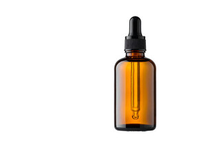 Amber bottle with dropper on black