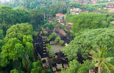 Aerial view of Pura Gunung Lebah, a Hindu temple complex with traditional Balinese architecture,...
