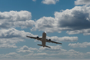 Airplane in the Sky -  Vacation -  Travel - Holidays - Tourism 
