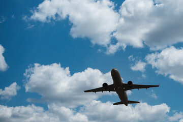 Airplane in the Sky -  Vacation -  Travel - Holidays - Tourism 
