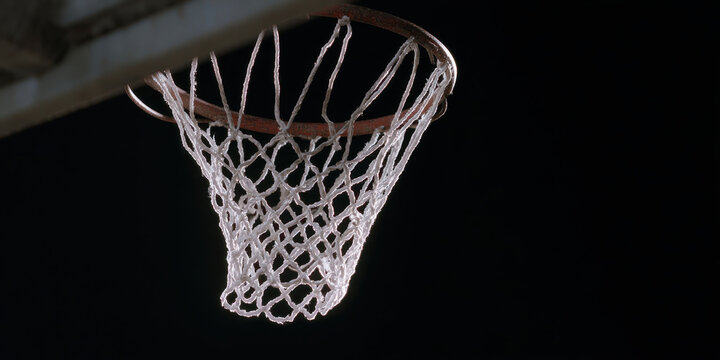 Basketball hoop with chain net under vintage lighting