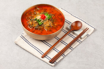  Eel soup is a spicy stew made with chopped eel, dried radish greens, dried pollack, bracken, green...
