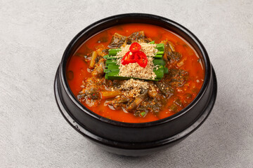  Eel soup is a spicy stew made with chopped eel, dried radish greens, dried pollack, bracken, green onions, and red peppers.
 