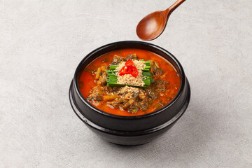  Eel soup is a spicy stew made with chopped eel, dried radish greens, dried pollack, bracken, green onions, and red peppers.
 