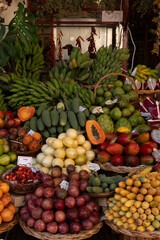 Colorful fruit stand with tropical produce in market