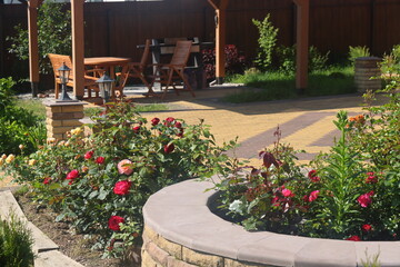 flowerbed and flowers on a summer cottage, roses and landscape design, 2