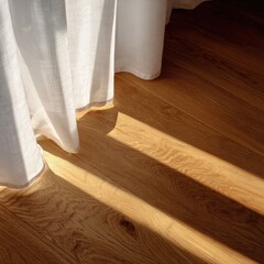 Sunlight streams onto light hardwood floors, with sheer curtains draped beside